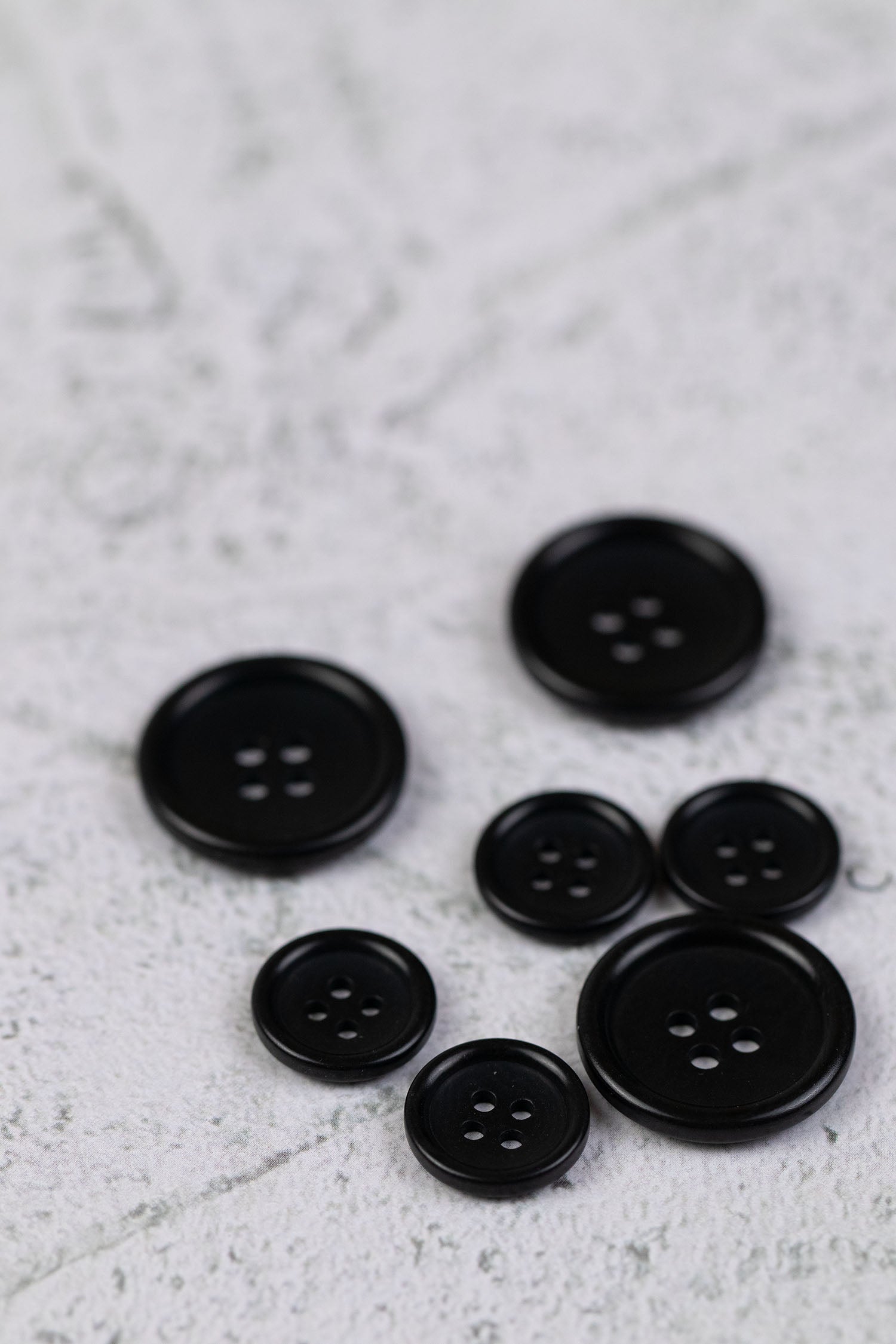 Corozo 4 Hole Rim Edge Black