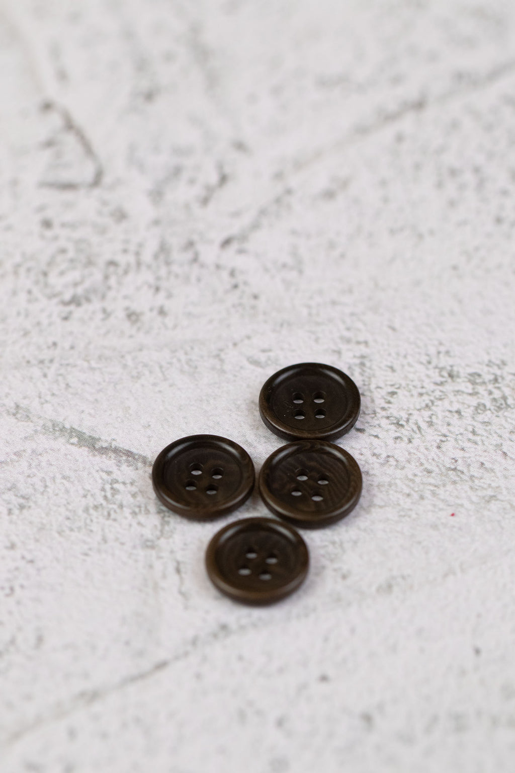 Corozo 4 Hole Rim Edge Brown