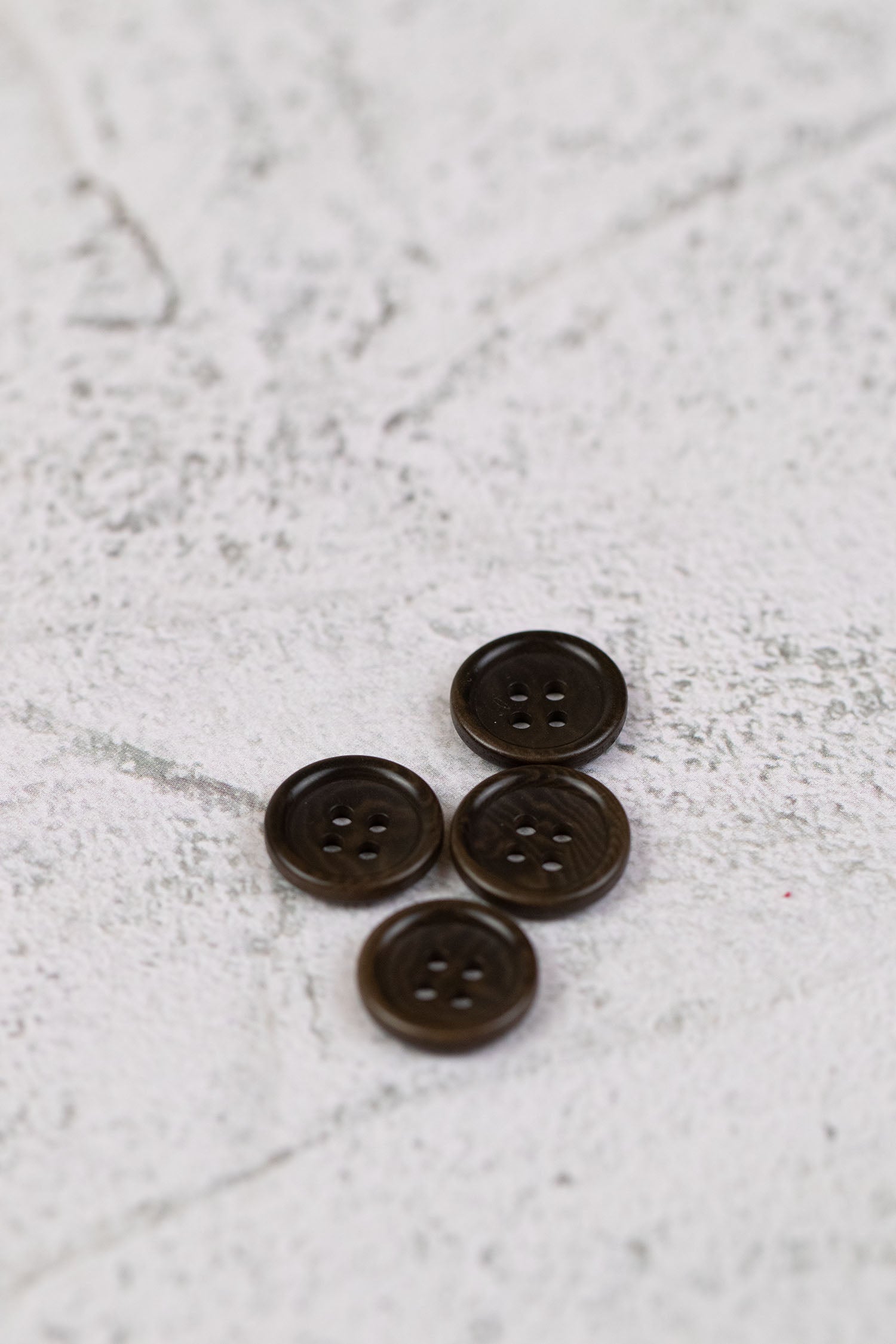 Corozo 4 Hole Rim Edge Brown