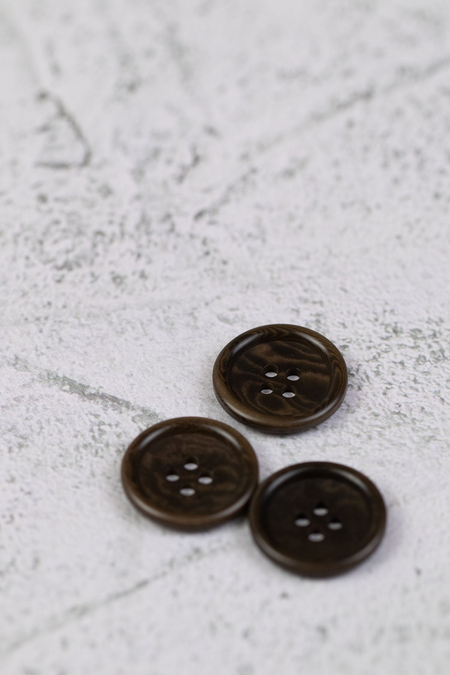 Corozo 4 Hole Rim Edge Brown