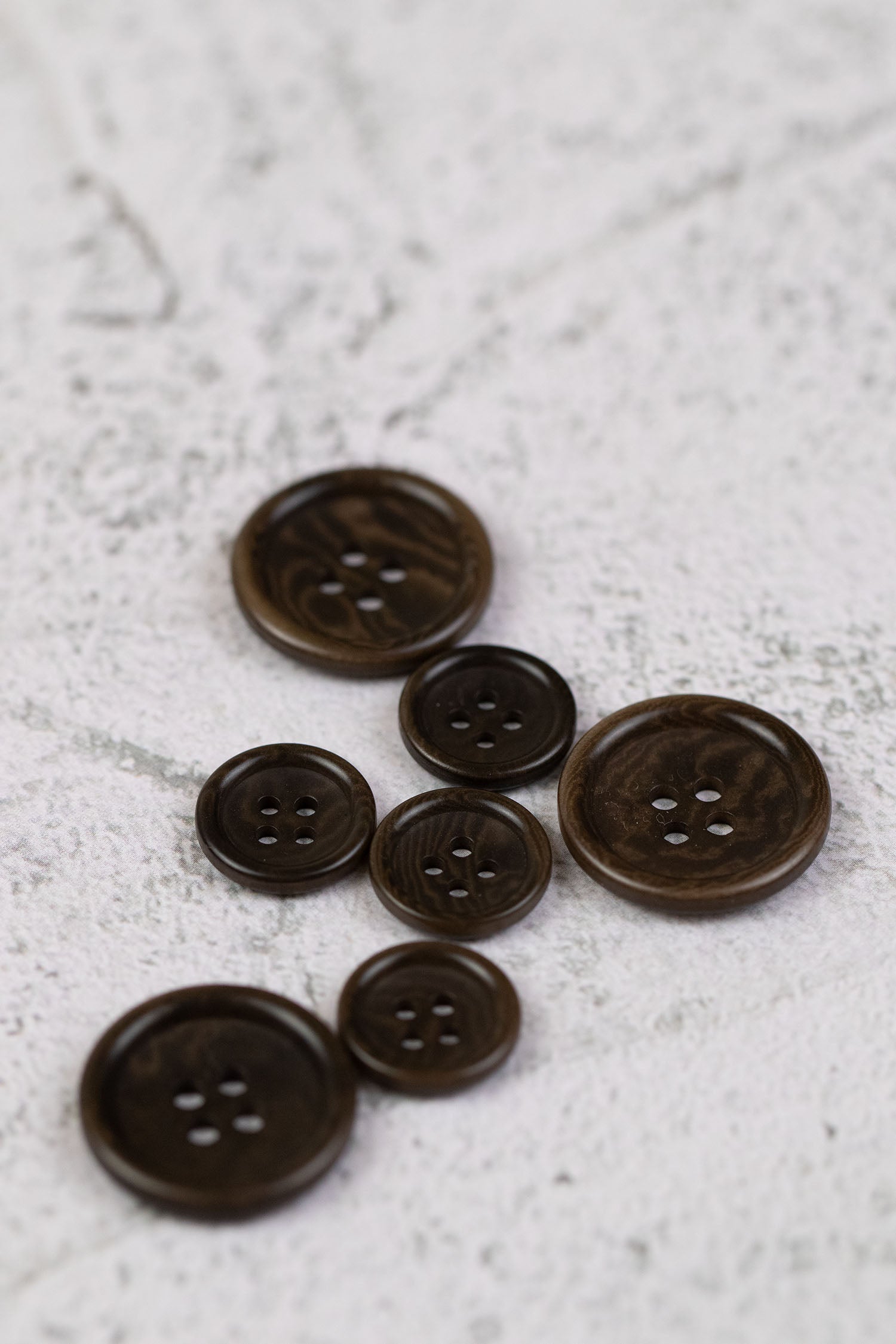 Corozo 4 Hole Rim Edge Brown