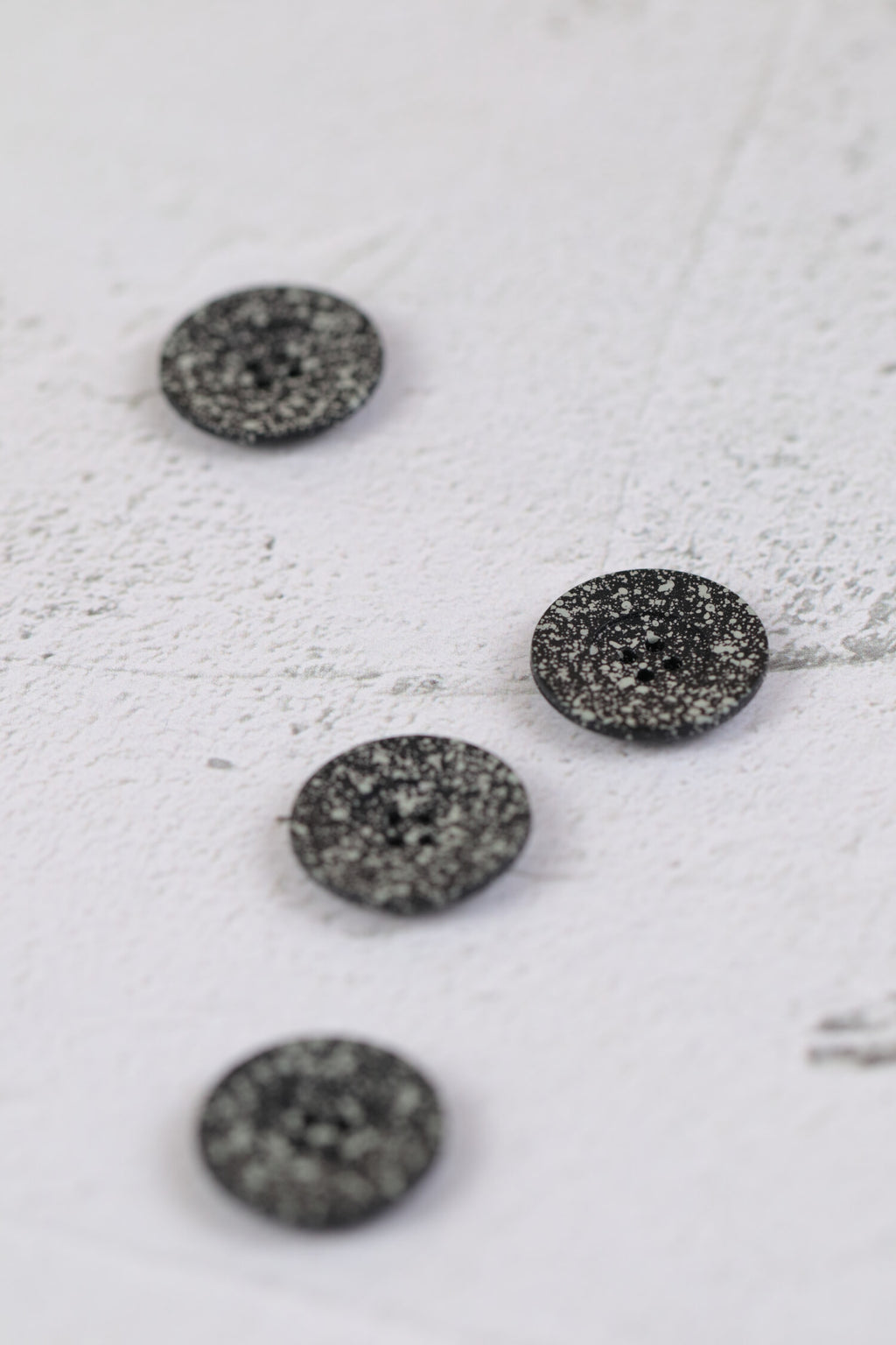 Matte Spotty 4 Hole Grey