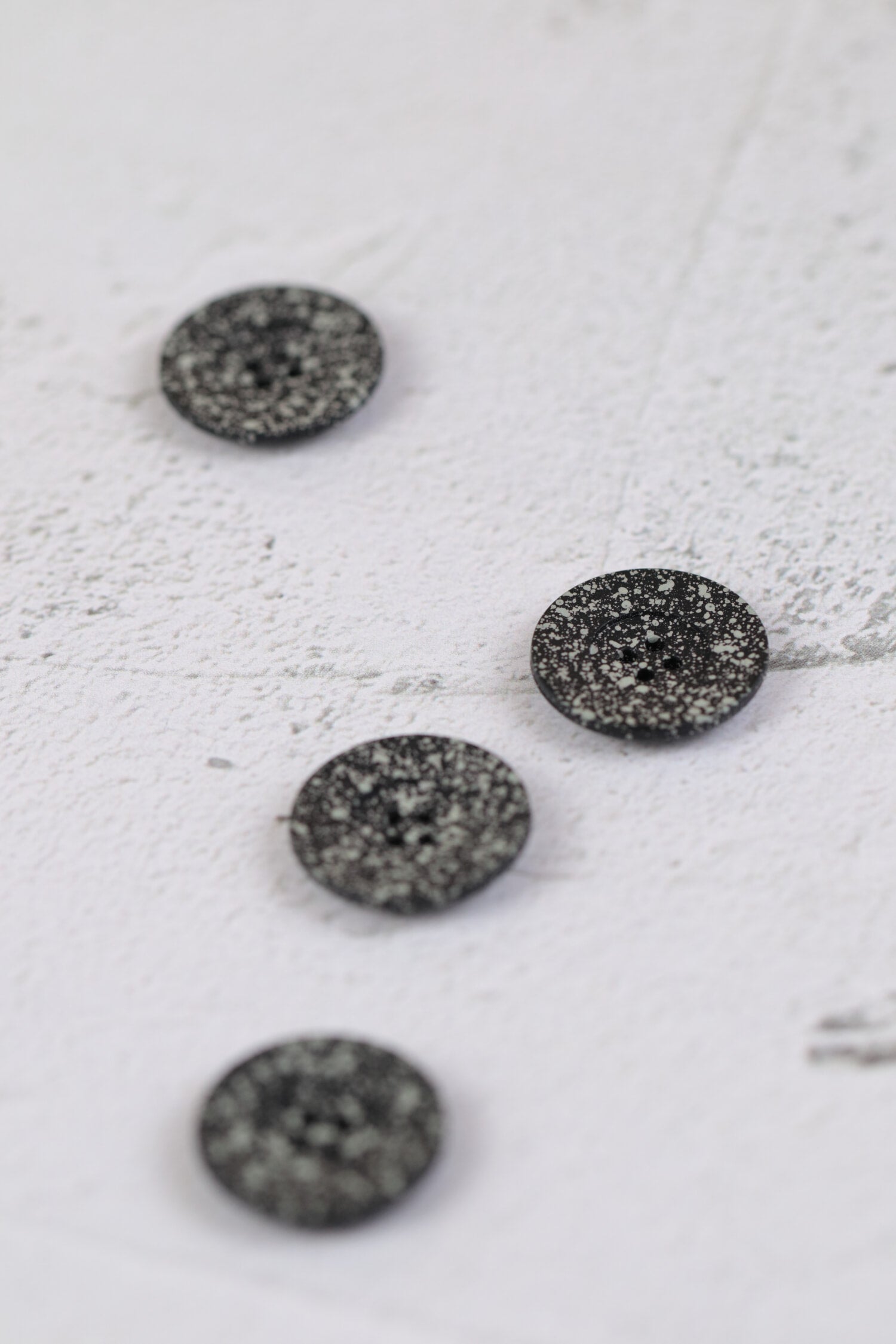 Matte Spotty 4 Hole Grey