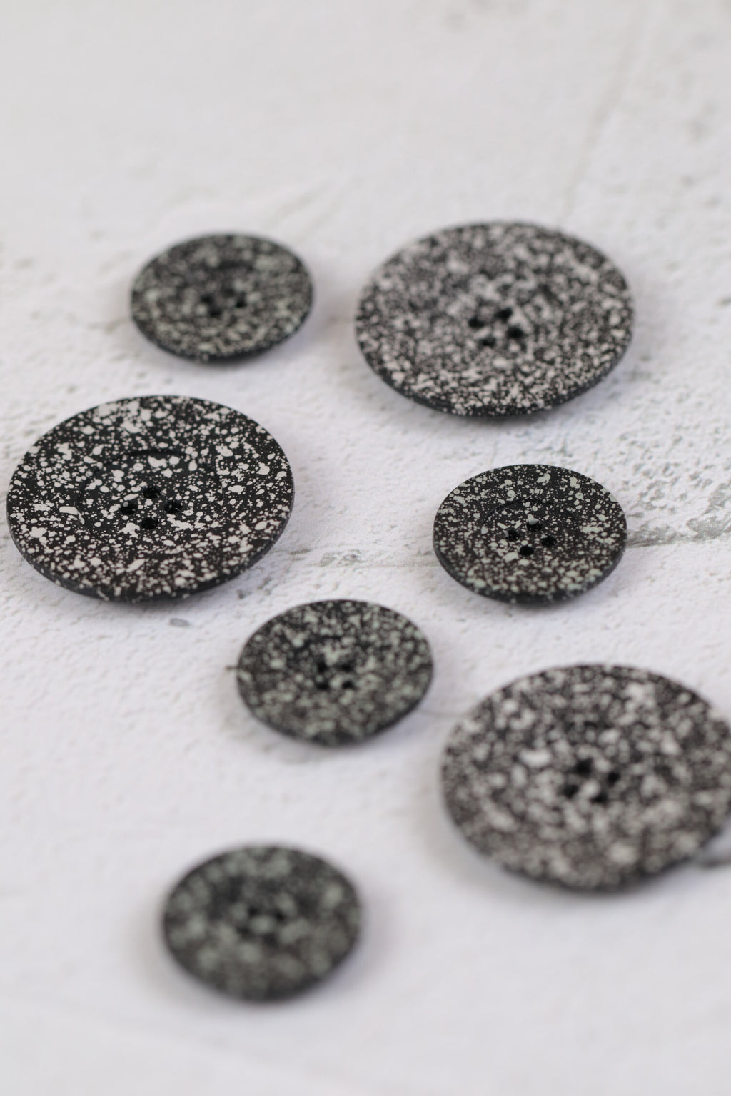 Matte Spotty 4 Hole Grey